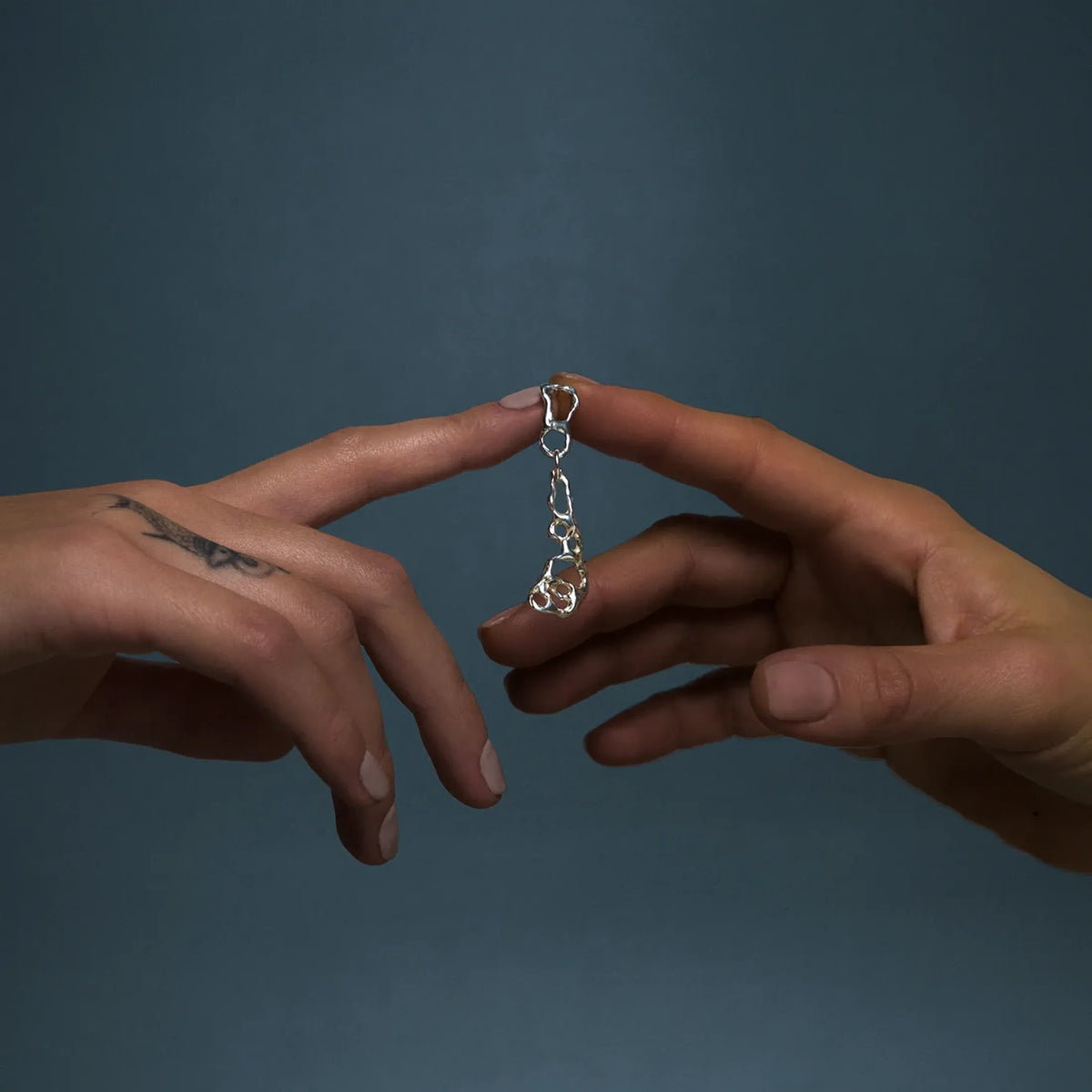T Mov Earrings
